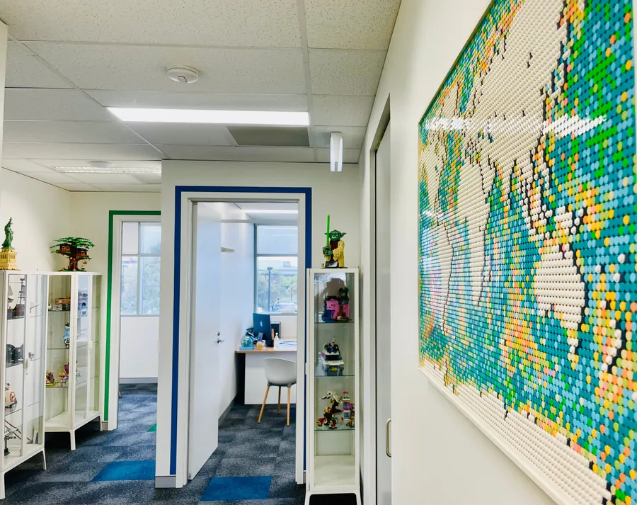 The corridor, with a wall-sized Lego map